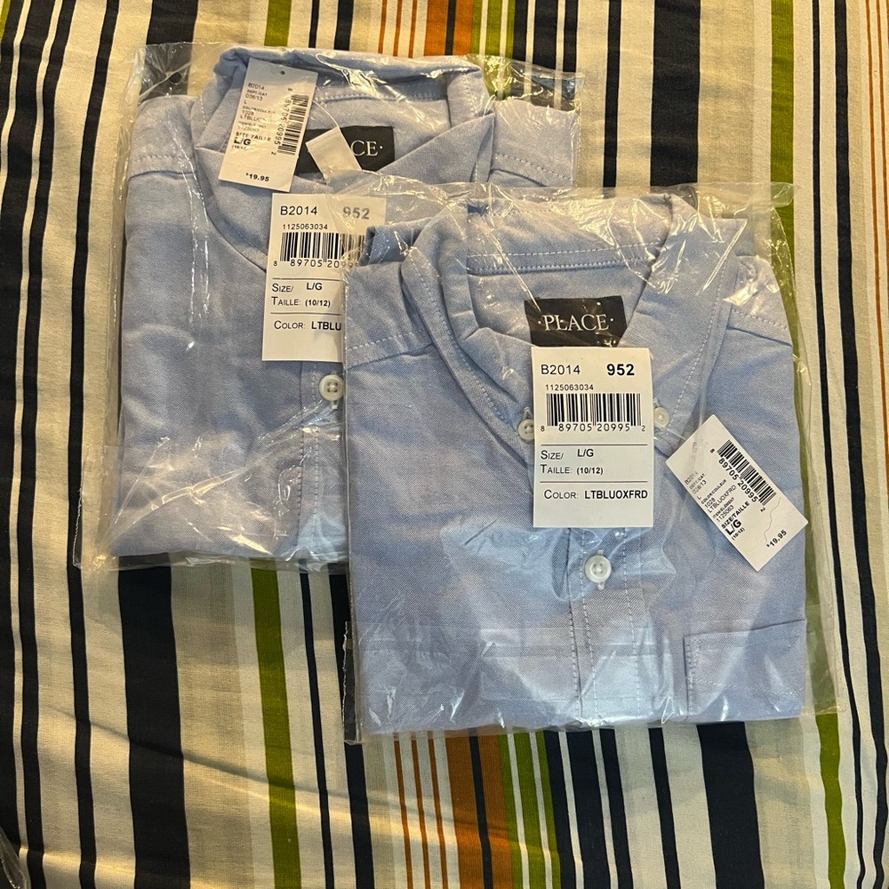 NEW - boys light blue Oxford uniform tops. Selling as a set (2) size: Lg 10/12